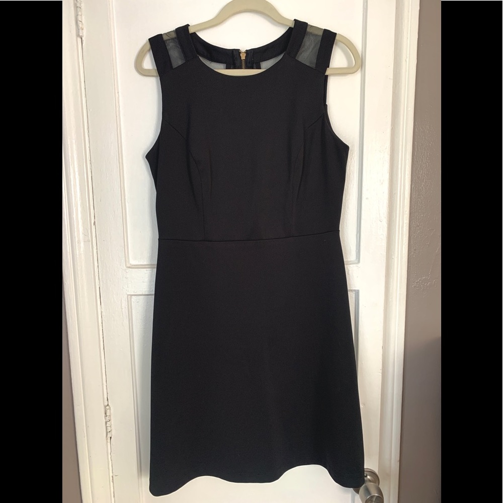 Little black dress with mesh detailing. Size 8